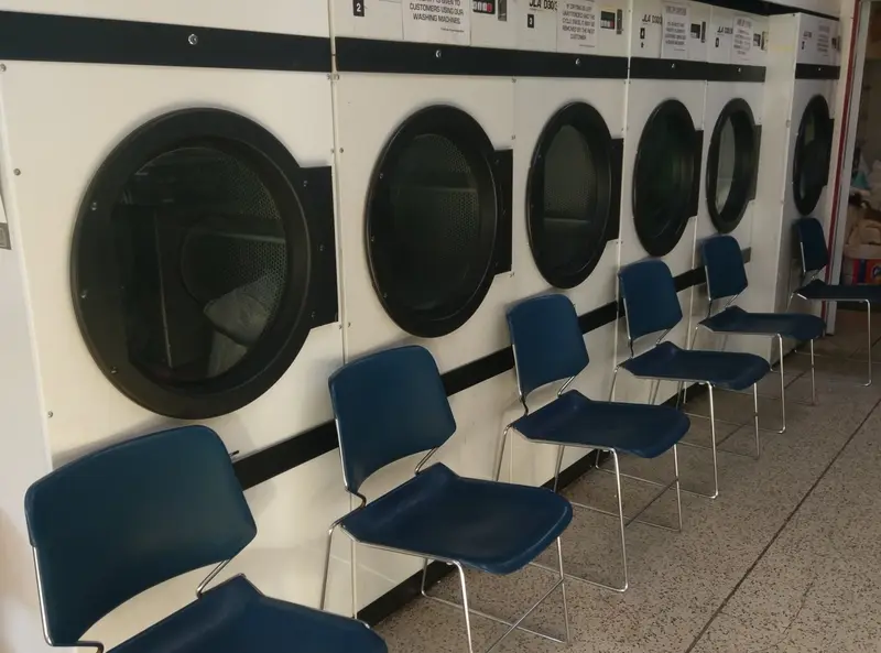Row of commercial washing machines Laundry & Ironing 4U Herefordshire